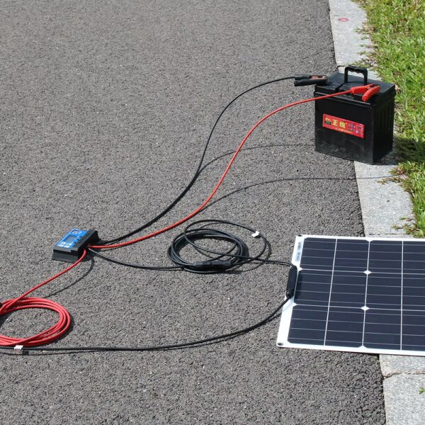 Solar Panel Kit charges car battery for living off the grid