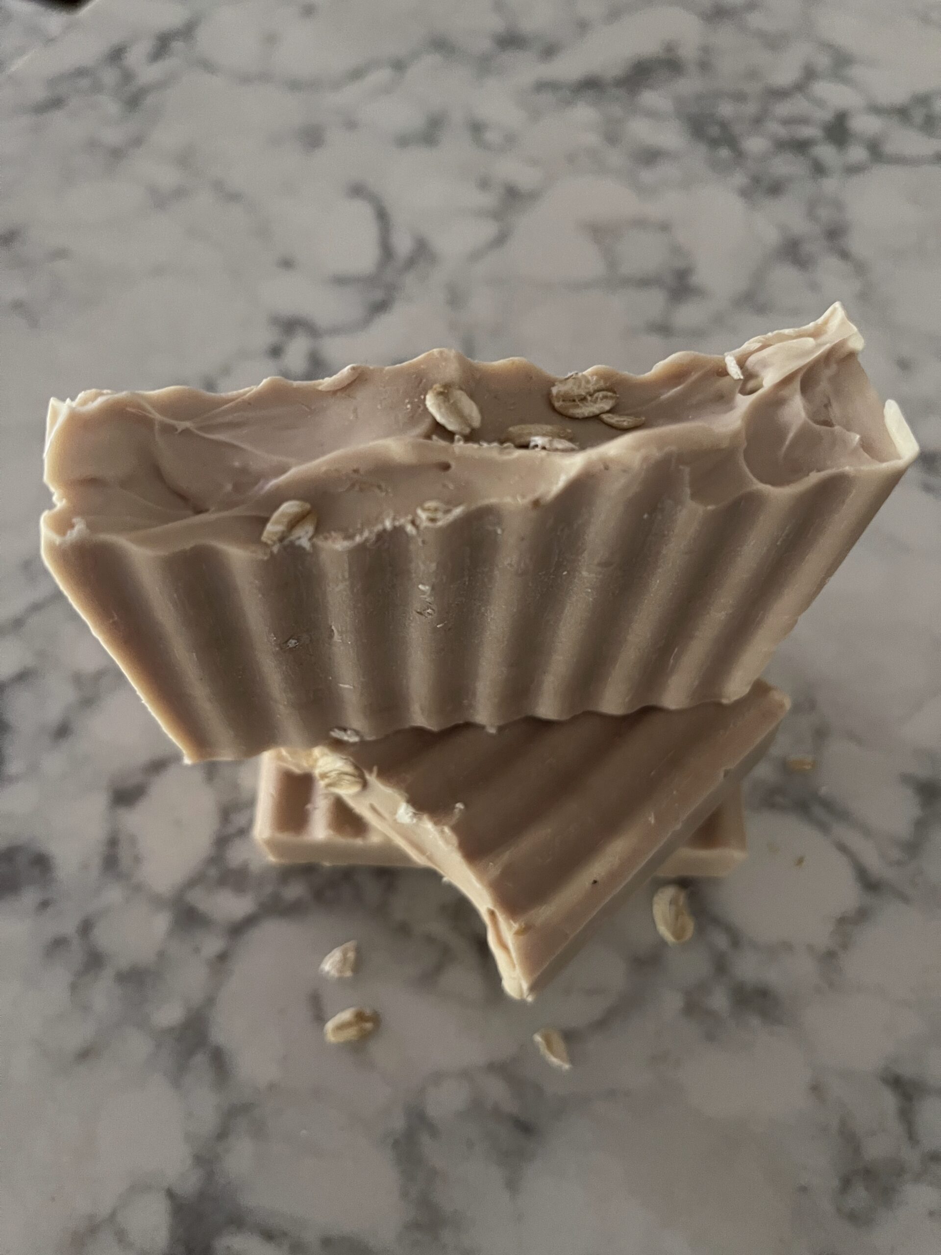 close up of goat milk and oats cold processed handcrafted soap